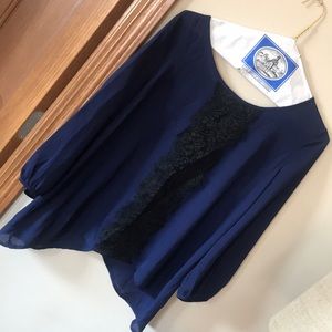 Blue top with black lace accent